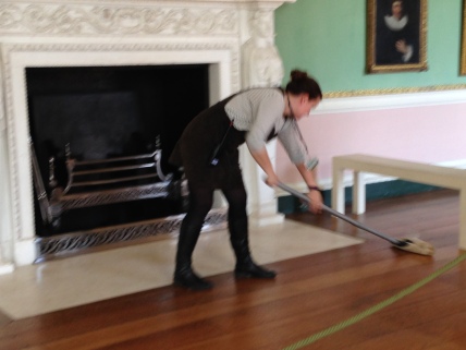 Ffion waxing the Long Gallery floor at Osterley Park (image: Osterley Park)